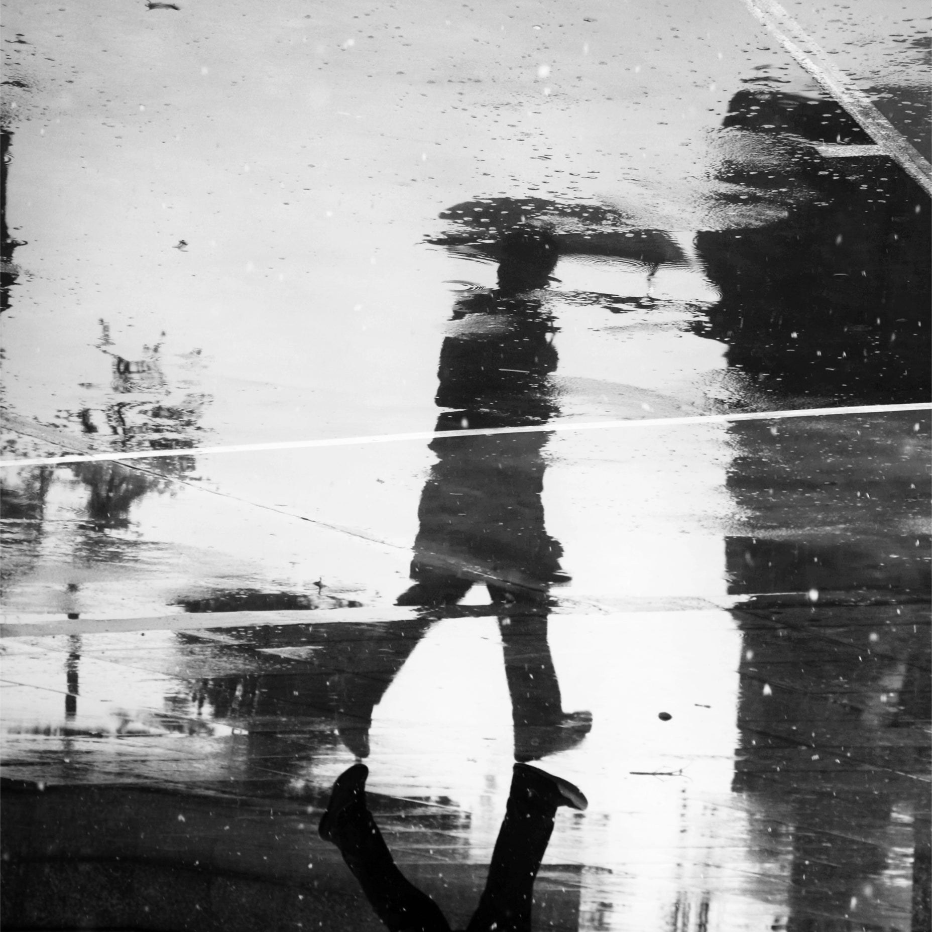 Man Reflection on a Wet Street Black & White Photography Poster