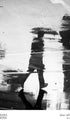 Man Reflection on a Wet Street Poster