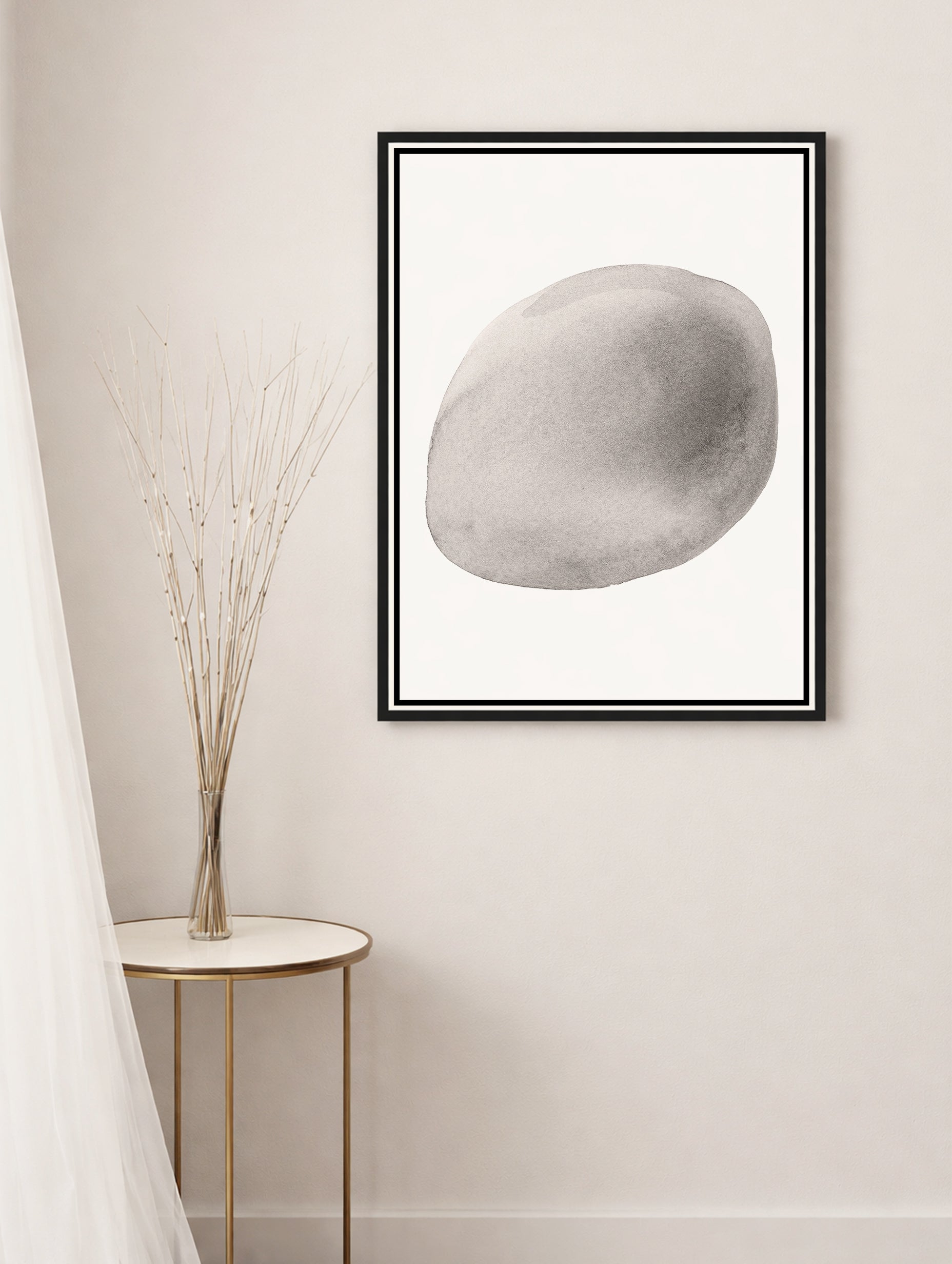 Minimalistisk kunsttrykk med grå stein